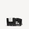Billetera tipo clutch «Chips» en negro Billetera tipo clutch «Chips» en negro