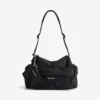 Bolsa con cremallera y dije para hombre en negro Bolsa con cremallera y dije para hombre en negro