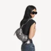 Bolso de hombro Le Cagole para mujer XS en color plateado Bolso de hombro Le Cagole para mujer XS en color plateado