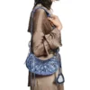 Bolso de hombro Le Cagole XS metalizado «Púrpura» 6713090GT3Y5214