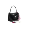 Bolso de mano pequeño Rodeo con efecto usado y un dije «Negro» 7897792AA831000