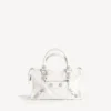 Bolso Le City para mujer, pequeño, con tachuelas gigantes y pedrería en blanco óptico Bolso Le City para mujer, pequeño, con tachuelas gigantes y pedrería en blanco óptico