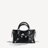 Bolso Le City para mujer, pequeño, con tachuelas gigantes y pedrería, en negro Bolso Le City para mujer, pequeño, con tachuelas gigantes y pedrería, en negro