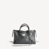 Bolso Le City pequeño en roca volcánica