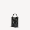 Bolso tipo tote para mujer «Le City» con soporte para celular, en negro Bolso tipo tote para mujer «Le City» con soporte para celular, en negro