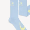 Calcetines deportivos con icono en bucle para hombre en azul/amarillo