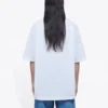 Camiseta blanca de manga corta holgada con logo de letras pequeñas 556104TYK289000