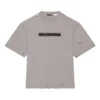 Camiseta unisex de manga corta, cuello redondo con agujeros y estampado de letras en color liso, gris 661715TKVD58174