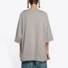 Camiseta unisex de manga corta, cuello redondo con agujeros y estampado de letras en color liso, gris 661715TKVD58174