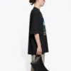 Camiseta unisex negra de manga corta con estampado retro y tejido liso, talla grande, colección SS21 641614TJVH61000