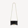 Cartera de mujer con forma de Hourglass y cadena, en color negro Cartera de mujer con forma de Hourglass y cadena, en color negro
