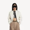 Chaqueta bomber corta para mujer en color marfil Chaqueta bomber corta para mujer en color marfil
