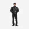 Chaqueta de piel de cordero con cremallera para hombre en negro