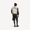Chaqueta universitaria para hombre de Balenciaga | Colaboración con la NBA en color marfil Chaqueta universitaria para hombre de Balenciaga | Colaboración con la NBA en color marfil