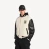 Chaqueta universitaria para hombre de Balenciaga | Colaboración con la NBA en color marfil Chaqueta universitaria para hombre de Balenciaga | Colaboración con la NBA en color marfil