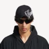 Gorra para hombre con diseño en cursiva en negro lavado Gorra para hombre con diseño en cursiva en negro lavado