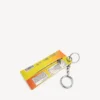 Llavero/colgante para hombre con forma de bolsa de bocadillos en amarillo Llavero/colgante para hombre con forma de bolsa de bocadillos en amarillo