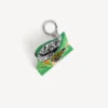 Llavero con dije «chips» en verde Llavero con dije «chips» en verde