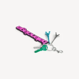 Llavero con dijes de Balenciaga estilo motero para mujer en rosa/negro