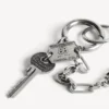 Llavero Neverlost para hombre en plata antigua Llavero Neverlost para hombre en plata antigua