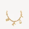 Llavero para mujer con dijes en dorado Llavero para mujer con dijes en dorado