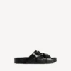 Mules con cinturones para hombre en negro