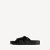 Mules con cinturones para hombre en negro