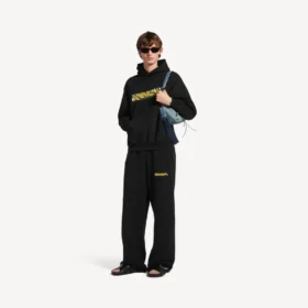 Pantalones de chándal holgados para hombre con diseño de spray desordenado en negro