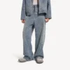 Pantalones de denim holgados para hombre con diseño de puntadas en azul oscuro Pantalones de denim holgados para hombre con diseño de puntadas en azul oscuro