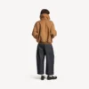 Pantalones de mezclilla con corte curvo para hombre en índigo sin tratar Pantalones de mezclilla con corte curvo para hombre en índigo sin tratar