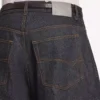 Pantalones de mezclilla con corte curvo para hombre en índigo sin tratar Pantalones de mezclilla con corte curvo para hombre en índigo sin tratar