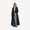 Pantalones de mezclilla holgados de tiro bajo para mujer en azul vintage desgastado Pantalones de mezclilla holgados de tiro bajo para mujer en azul vintage desgastado