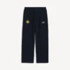 Pantalones holgados de fútbol para hombre en negro