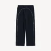 Pantalones holgados de fútbol para hombre en negro