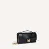 Pochette de mujer con forma de Hourglass y cadena en negro Pochette de mujer con forma de Hourglass y cadena en negro