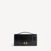 Pochette de mujer con forma de Hourglass y cadena en negro Pochette de mujer con forma de Hourglass y cadena en negro