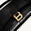 Pochette de mujer con forma de Hourglass y cadena en negro Pochette de mujer con forma de Hourglass y cadena en negro