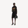 Sudadera con capucha Balenciaga Sacra Cœur para mujer, corte medio, en negro