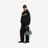 Sudadera con capucha para hombre de corte mediano con diseño «Messy Spray» en negro Sudadera con capucha para hombre de corte mediano con diseño «Messy Spray» en negro