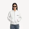 Sudadera con capucha y cremallera de corte regular para mujer de Salon de Couture en blanco Sudadera con capucha y cremallera de corte regular para mujer de Salon de Couture en blanco