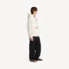 Sudadera con capucha y cremallera oversize para hombre con diseño de tatuaje en color crema Sudadera con capucha y cremallera oversize para hombre con diseño de tatuaje en color crema