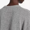 Suéter corto de mujer con cuello redondo en gris jaspeado Suéter corto de mujer con cuello redondo en gris jaspeado