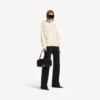 Suéter de cuello alto para mujer, con diseño invertido, en blanco roto Suéter de cuello alto para mujer, con diseño invertido, en blanco roto