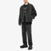 Suéter de manga corta con estampado multilingüe para hombre, negro 612966TJVI32771