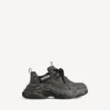 Zapatilla de lona Triple S para hombre en negro