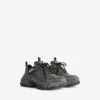 Zapatilla de lona Triple S para hombre en negro