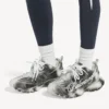 Zapatilla deportiva para mujer con logotipo estampado en negro/blanco Zapatilla deportiva para mujer con logotipo estampado en negro/blanco