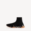 Zapatilla deportiva Speed 2.0 para hombre con suela transparente y tejido de punto reciclado en negro/naranja Zapatilla deportiva Speed 2.0 para hombre con suela transparente y tejido de punto reciclado en negro/naranja