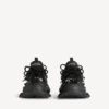 Zapatilla deportiva Track Piercing para hombre en negro Zapatilla deportiva Track Piercing para hombre en negro